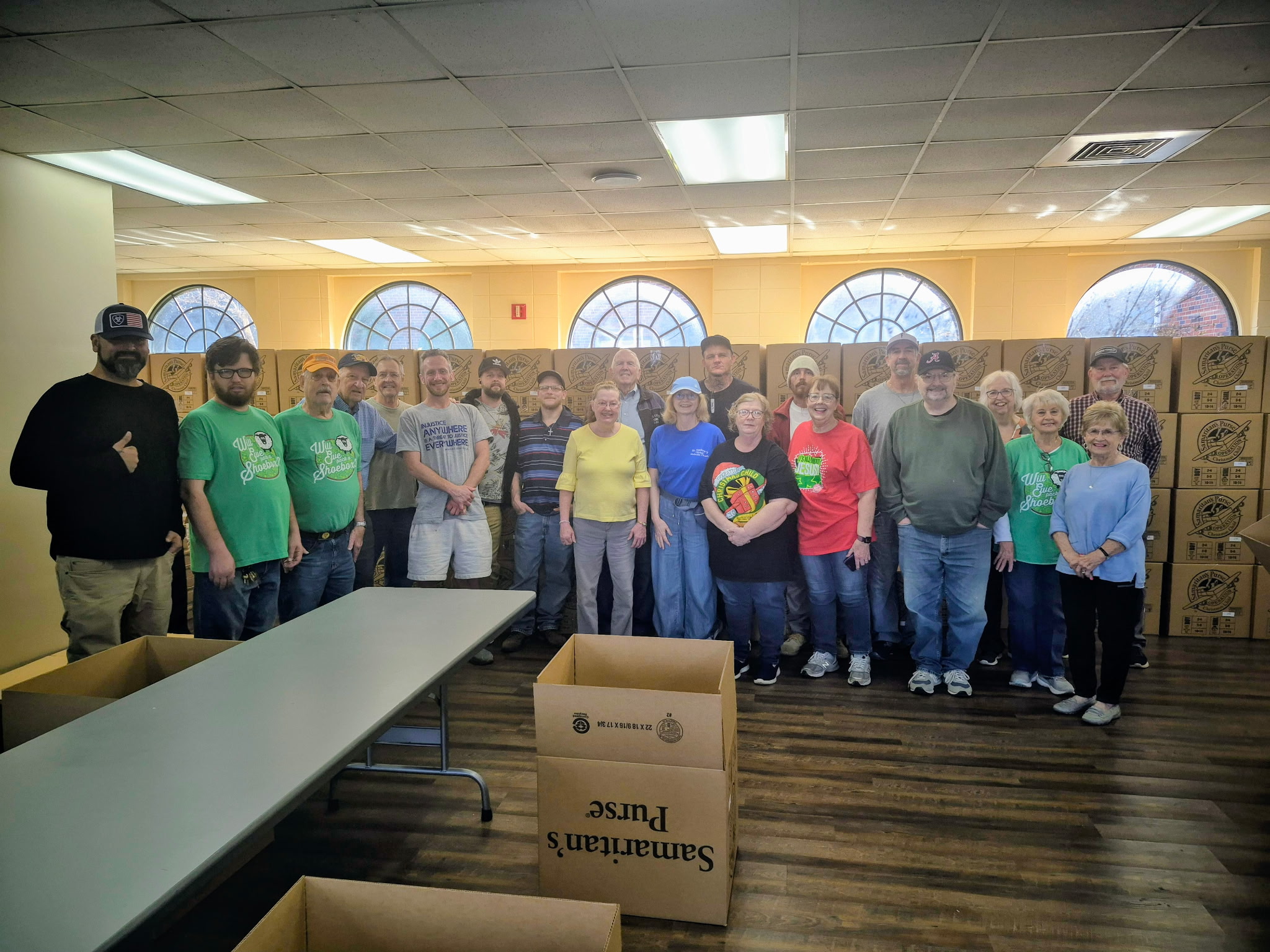 CREAA men and St. Andrew's volunteers serving with Operation Christmas Child