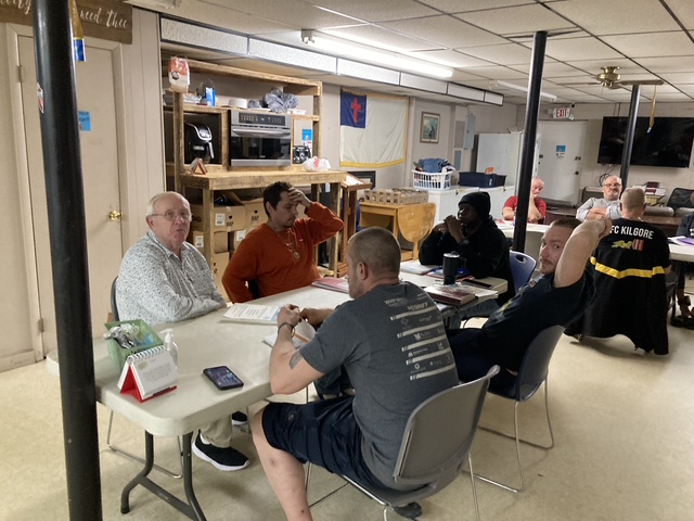 Men participating in a CREAA support group