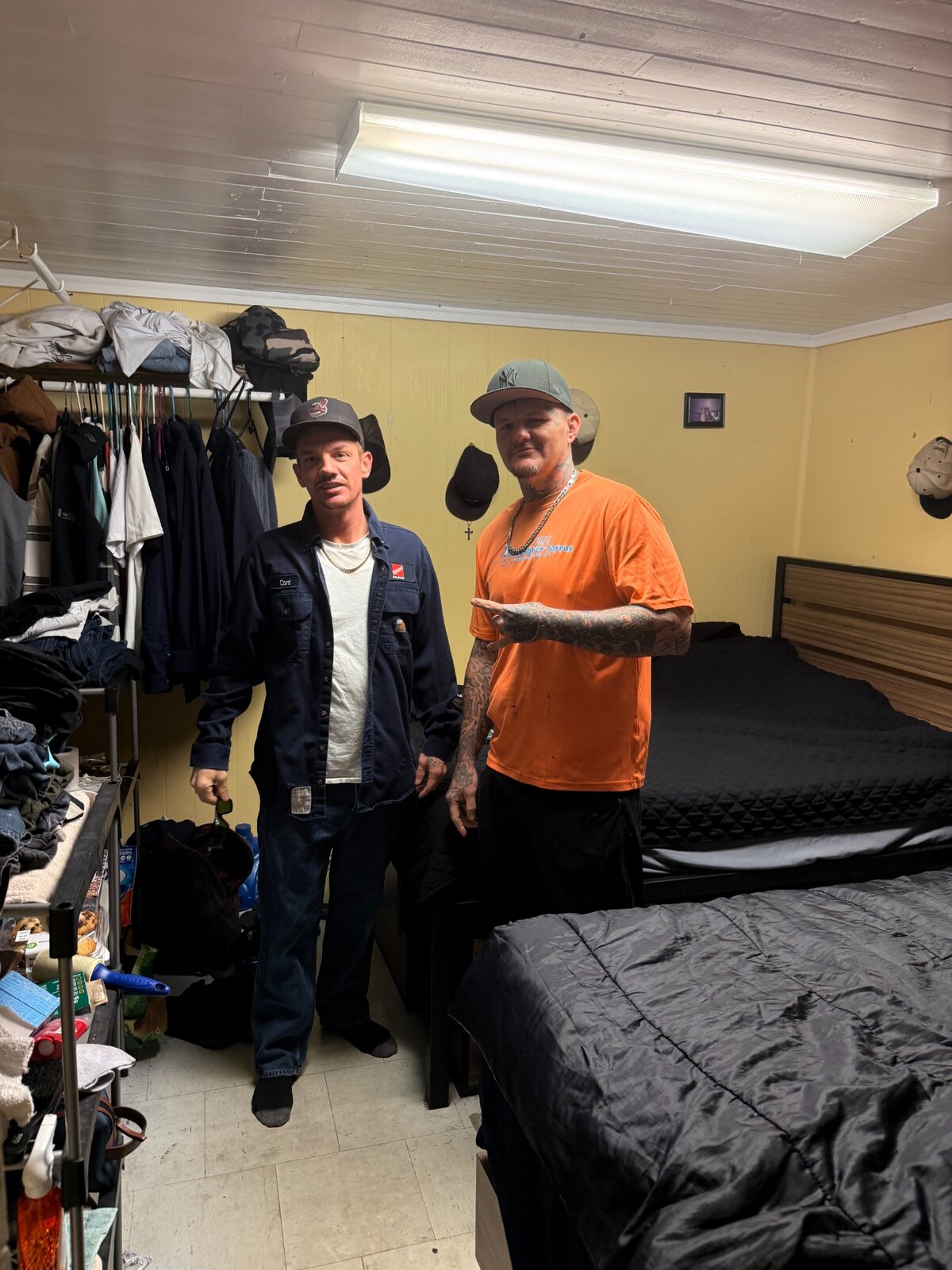 Two Bryan Clay House residents in their room